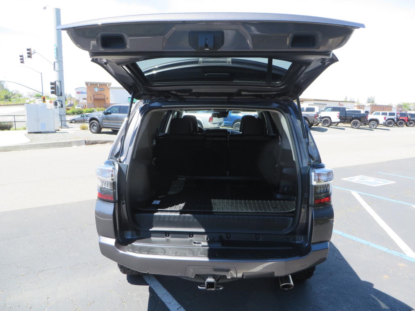 2021 CHARCOAL /BLACK Toyota 4Runner SR5 Premium 4WD (JTENU5JR0M5) with an 4.0L V6 DOHC 24V engine, 5A transmission, located at 2630 Grass Valley Highway, Auburn, CA, 95603, (530) 508-5100, 38.937893, -121.095482 - Clean SR5 Premium 7 passenger with a set of Bilstein 5100 series front struts and rear shocks, Bilstein 1" rear springs, 17" KMC 544 wheels, and Toyo RT Trail tires. - Photo#51